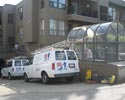 apartment building being prepared for window cleaning